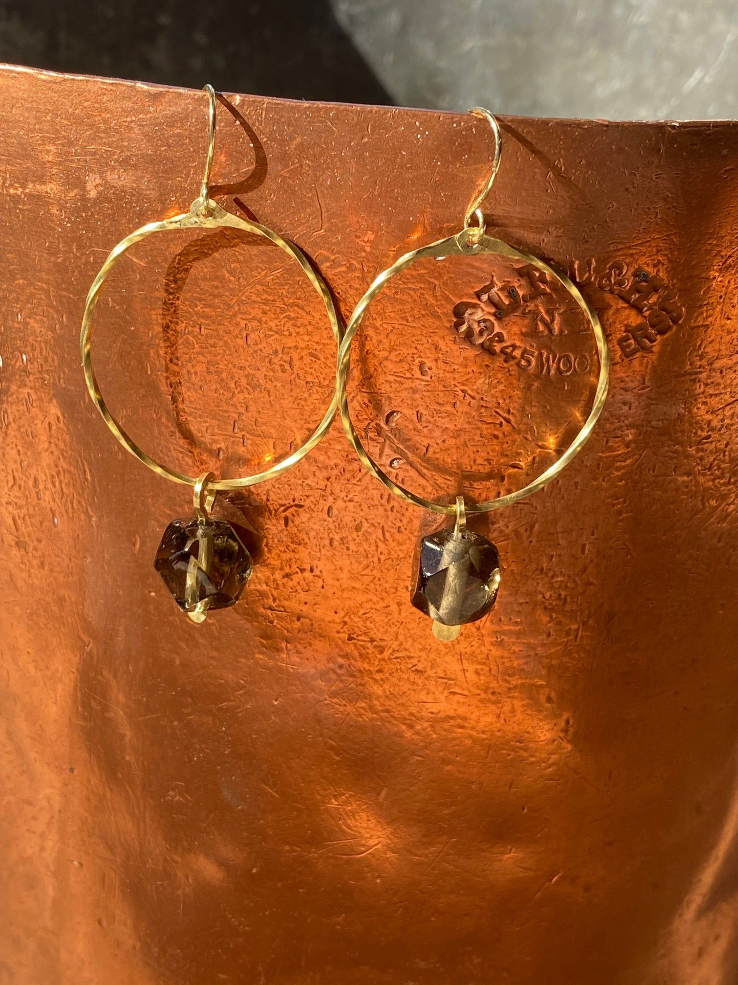 twisted hoops with smoky quartz