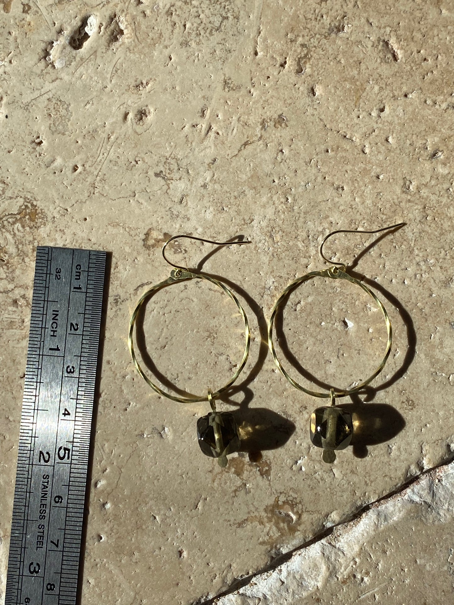 twisted hoops with smoky quartz