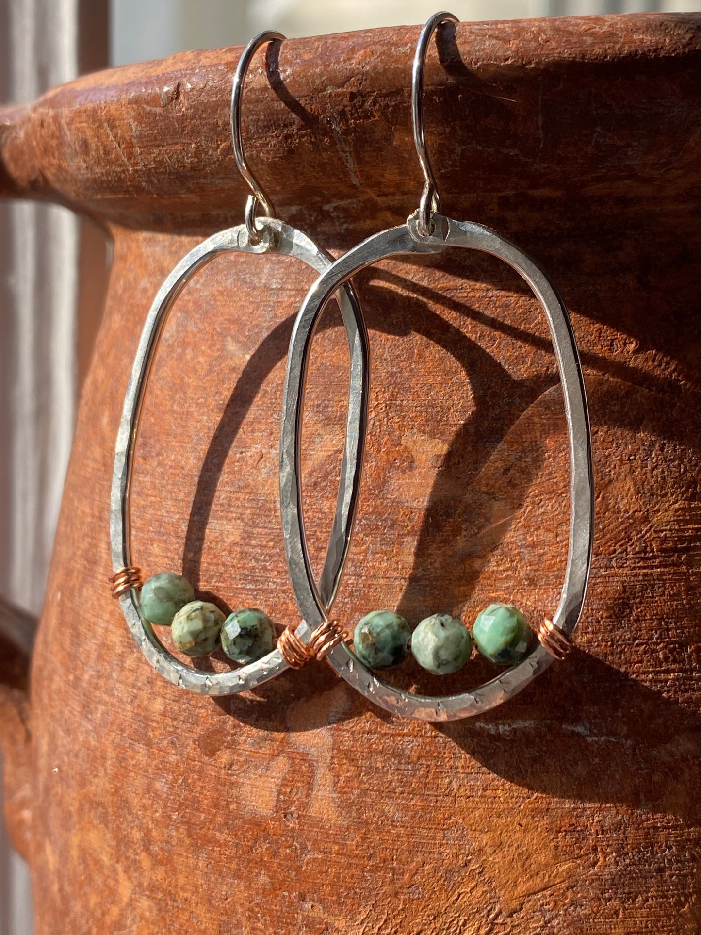 silver oval hoops with African turquoise
